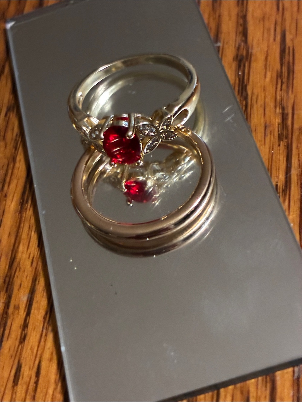 Gold Tone Ring with Red Gemstone
